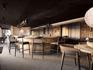 A modern bar area with a central island, bar stools, and pendant lighting. - Nirema Hotel & Spa Samos - Mgallery Collection (Samos)