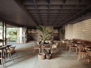 A modern restaurant interior with wooden furniture, a central dining table, and a view of the outdoors. - Nirema Hotel & Spa Samos - Mgallery Collection (Samos)