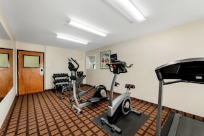 A gym with treadmills, an elliptical, and a rack of dumbbells. - Sonesta Essential Hotels Longview (Longview)