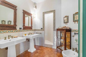 Shower, jetted tub, hair dryer, bidet