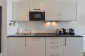 Apartamento, para não fumantes | Cozinha privada
