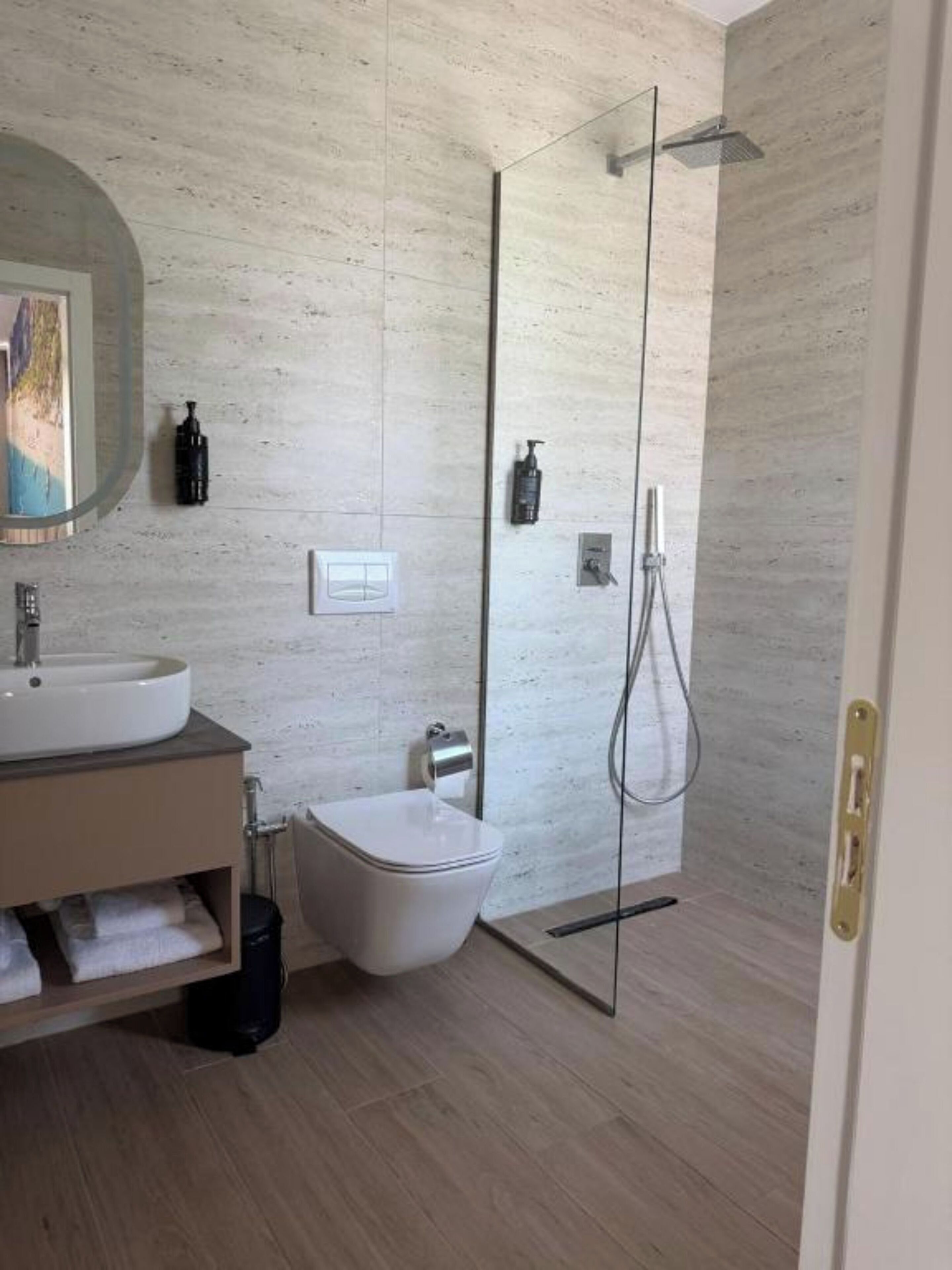 Twin Room, Balcony, City View | Bathroom | Shower, hair dryer, slippers, towels