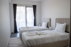 Departamento de lujo, 3 habitaciones | Espacio para trabajar con laptop y wifi gratis