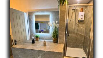 Shower, towels, soap, shampoo