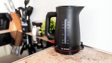 A kitchen with a Bosch electric kettle on the counter.