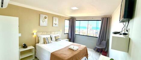 Deluxe Double Room, Partial Sea View | Iron/ironing board, free WiFi