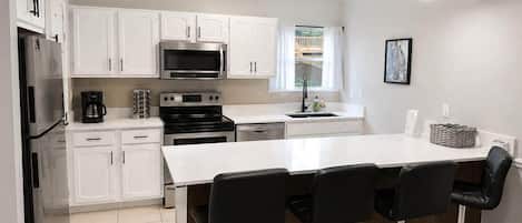 3. Kitchen and dining room area. Seating 4 people