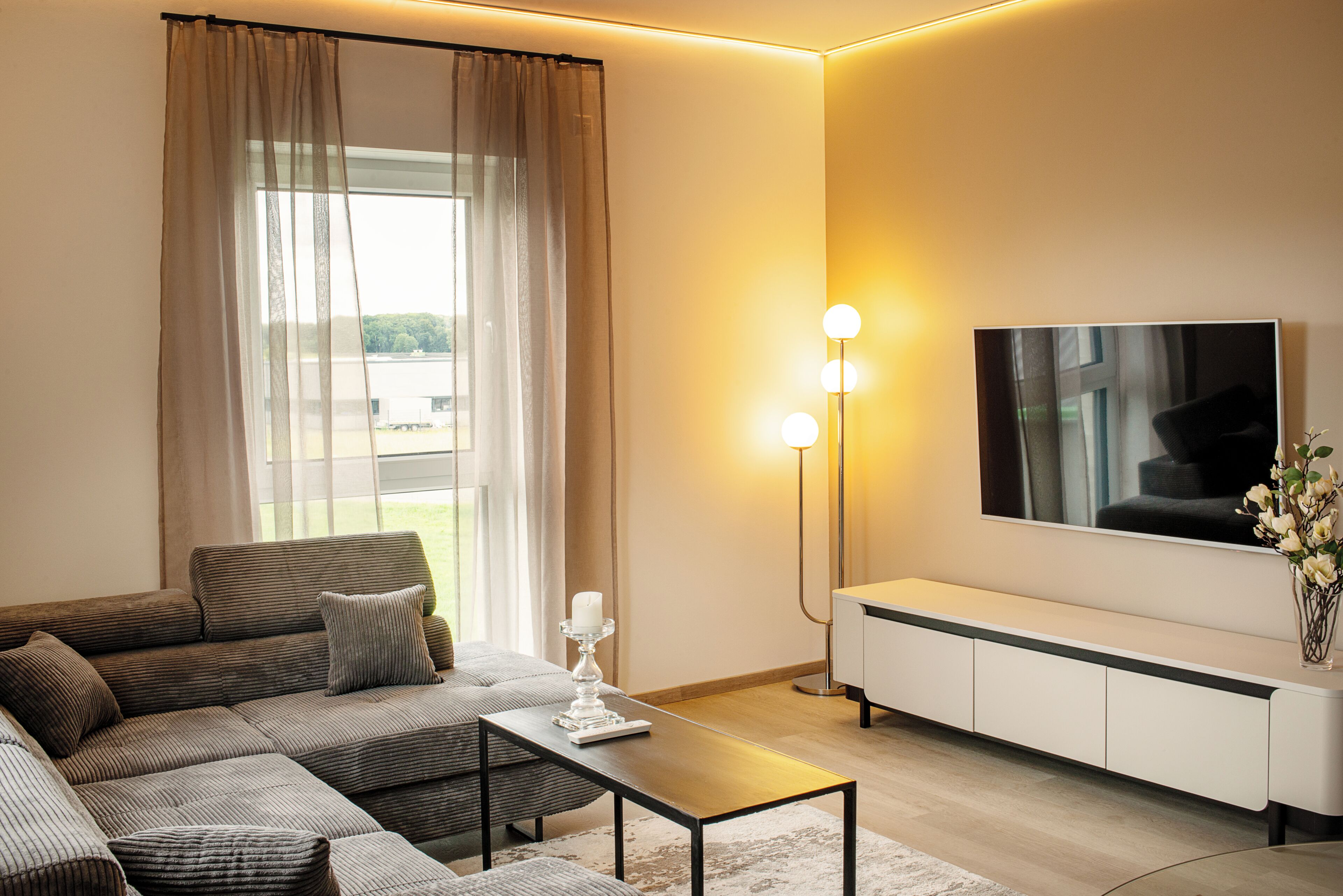 Apartamento Deluxe | Zona de estar | Suelo radiante