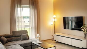 Deluxe Apartment | Living area | Heated floors