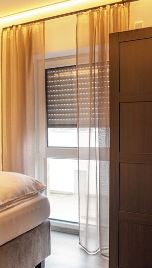 Deluxe-Apartment | Verdunkelungsvorhänge, schallisolierte Zimmer, Bügeleisen/Bügelbrett