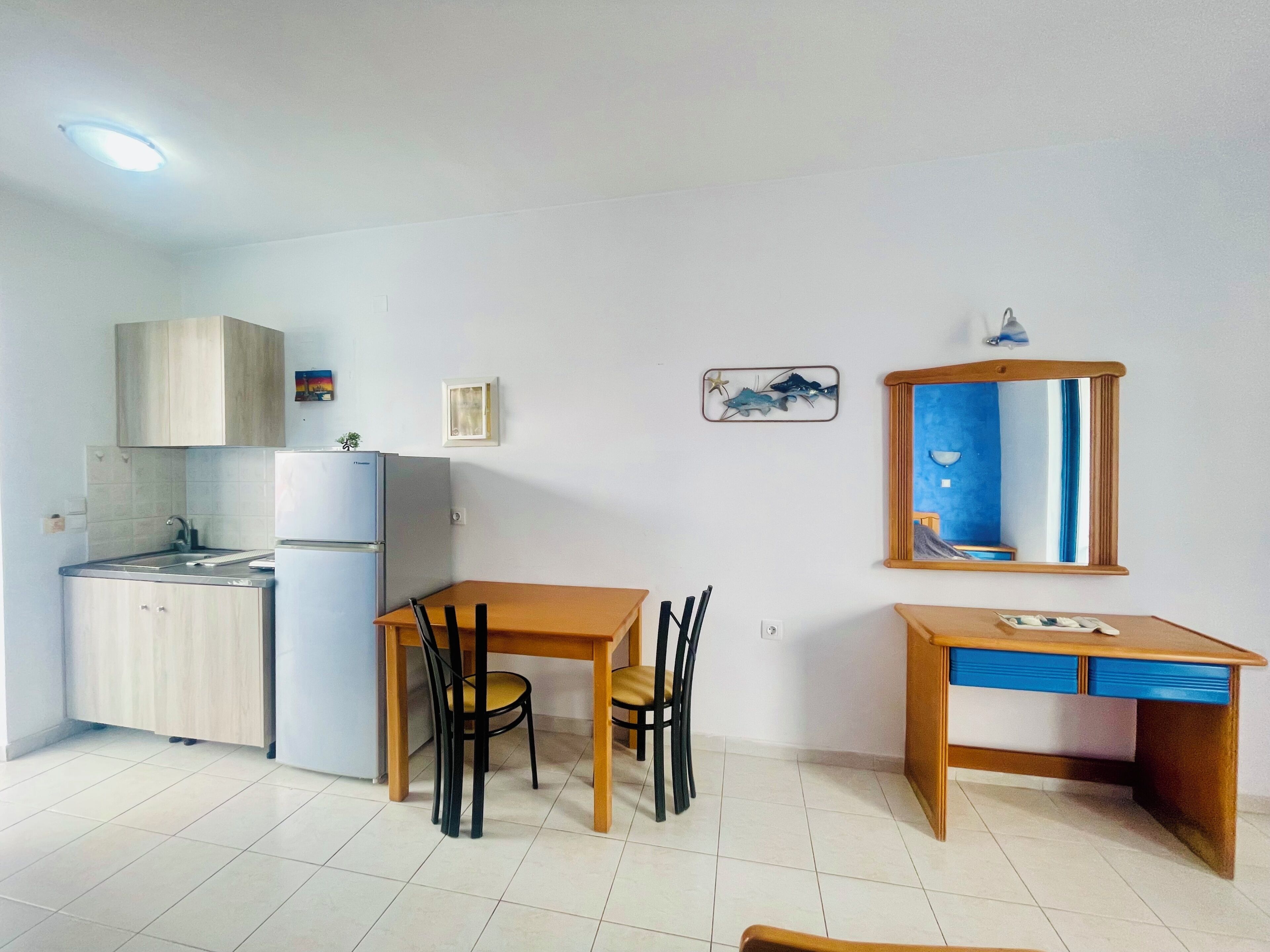 Apartment, Balcony | Private kitchen | Full-size fridge, stovetop, cookware/dishes/utensils