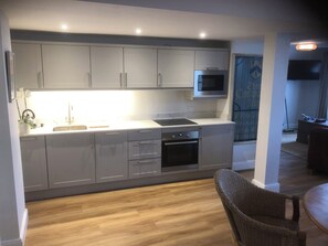 Private kitchen - New beach front sea view apartment superking or twin. Featured in Netflix series (Deal)