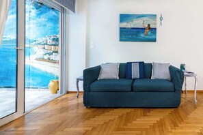 TV, offices - Seaside Escape with Balcony in Paleo Faliro (Paleo Faliro)