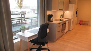 Apartamento luxo, vista para o jardim | Cozinha privada