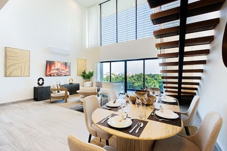Dining. Luxurious 3BR Penthouse in Punta Cana Village, 5 Mins to Airport.