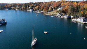 A marina with boats, docks, and houses along the shore. - Chester Back Harbour Exclusive providing direct access to water via private dock (Chester Basin)