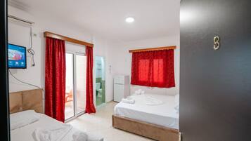 Habitación triple, balcón