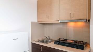 Habitación cuádruple, terraza | Cocina privada