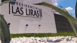 Un edificio con un letrero que dice 'RESIDENCIAL LAS LIRAS II'.