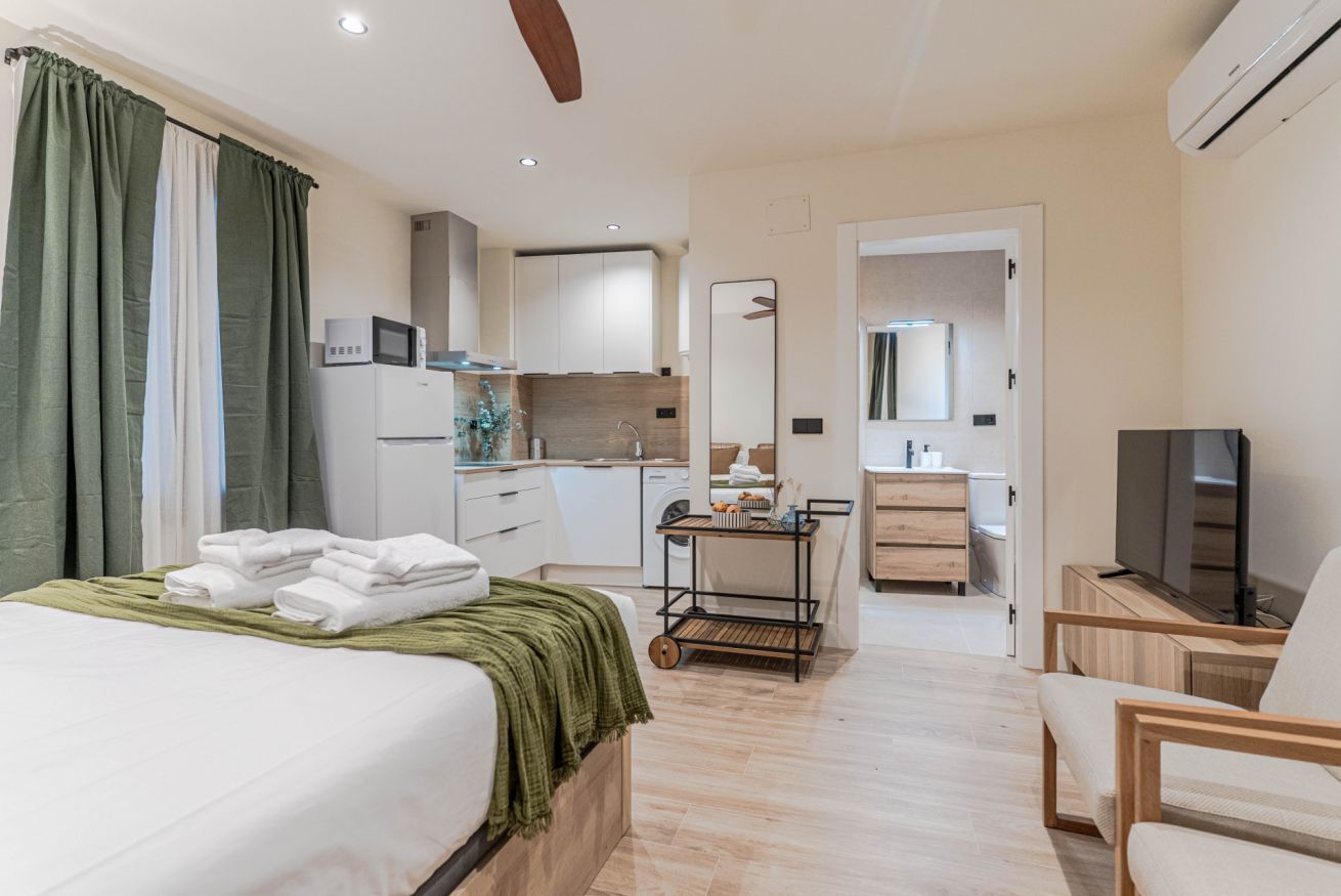 1 bedroom, desk, iron/ironing board, travel cot