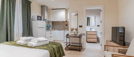 1 bedroom, desk, iron/ironing board, travel cot