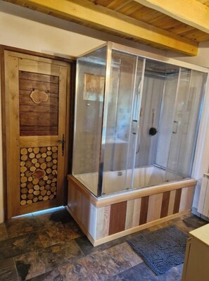 Shower, eco-friendly toiletries, hair dryer, towels