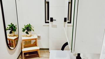 Hair dryer, towels, soap, shampoo