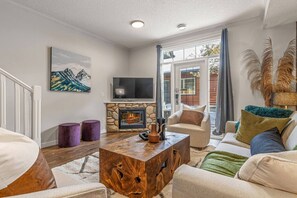 TV, fireplace - Mountain Chic | 2BR Family Escape | Hot Tub + Pool (Canmore)