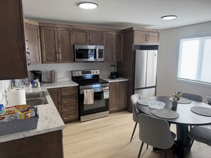 Microwave, oven, stovetop, dishwasher - Bright, Morden & Cozy 1 Bedroom Getaway (St. John's)