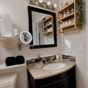 Hair dryer, bidet, towels, soap
