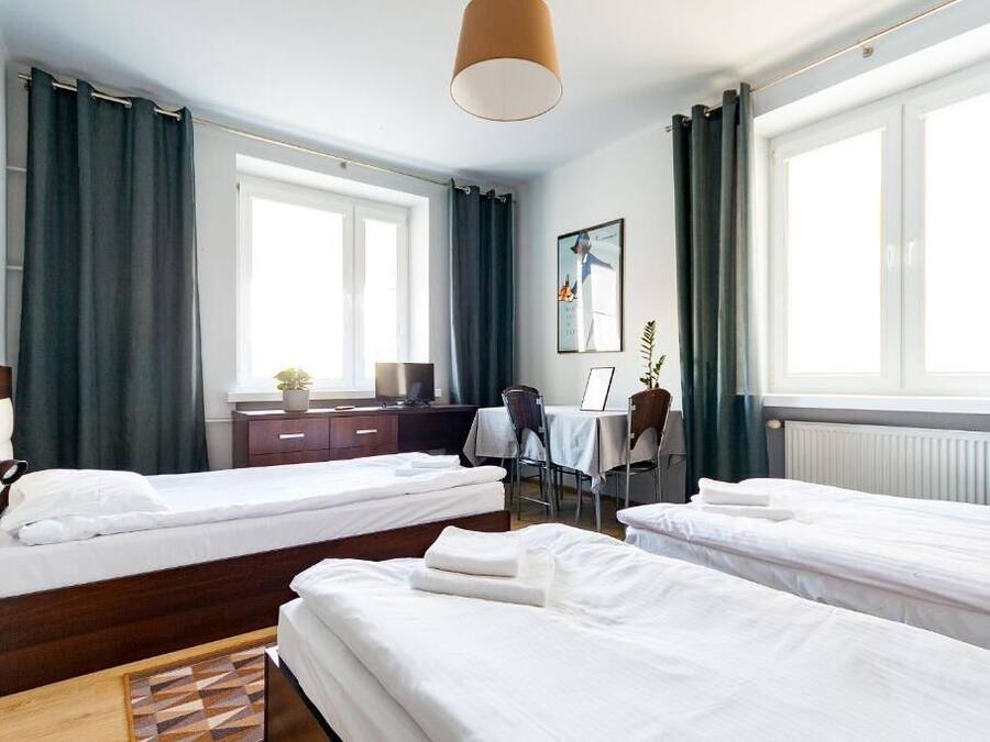 Triple Room, City View | Blackout curtains, iron/ironing board, free WiFi