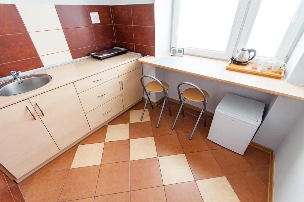 Triple Room, City View | Private kitchen