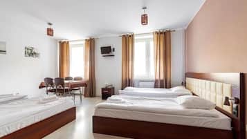 Family Room, City View | Blackout drapes, iron/ironing board, free WiFi