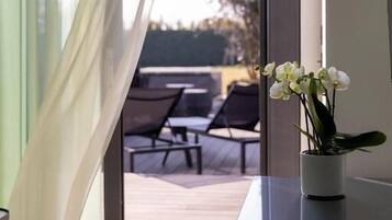 Svit - uteplats - utsikt mot trädgården | Interiör