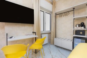 Habitación superior con 1 cama doble o 2 individuales, no fumadores, baño privado | Zona de estar