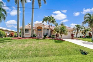 Exterior - 5BR/3BA Waterfront Oasis in Cape Coral | Heated Pool & Spa + Private Dock | Gulf Access (Cape Coral)