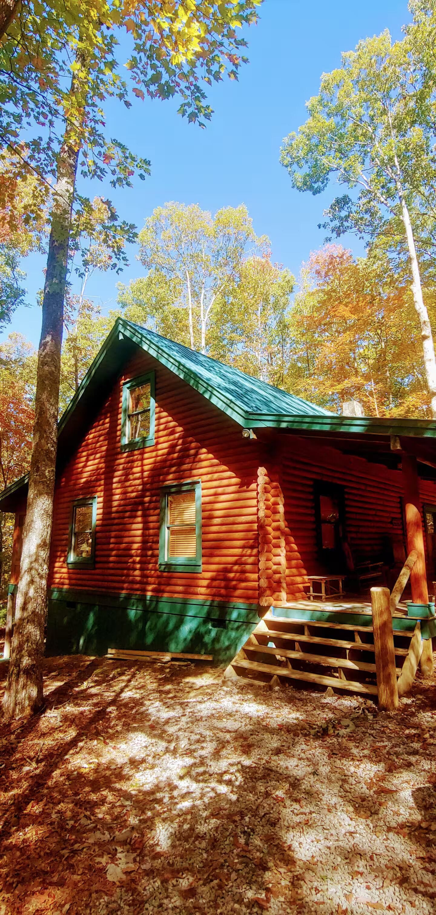 Steps from level driveway leading to front porch of Grouse Ridge Cabin