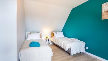2 chambres, fer et planche à repasser, Wi-Fi, draps fournis