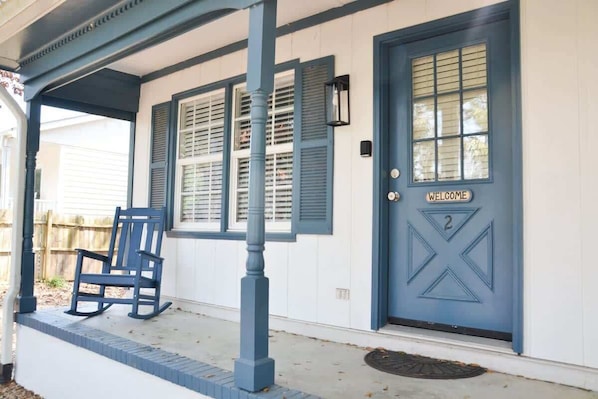 A house with a blue door marked 'WELCOME' and the number '2' on it. - Hoop Pole Creek Retreat • 5 Min to Beach Access (Atlantic Beach)