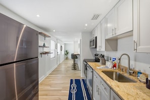 Fridge, microwave, stovetop, toaster - Boardwalk Beachhouse – Stylish Renovated Treasure Island Beach Retreat | Walk to the Beach (Treasure Island)