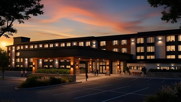 A modern hotel with a covered entrance, multiple floors, and a parking lot. - The Mindaro, part of JdV by Hyatt (Portland)