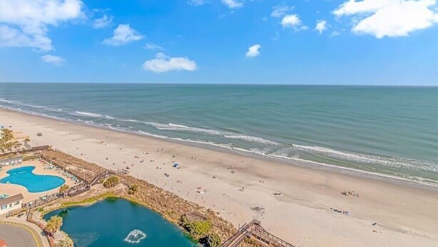 A beach resort with a swimming pool, beach, and ocean view. - Ocean View-Family Friendly condo, 211B, in Myrtle Beach Resort (Myrtle Beach)