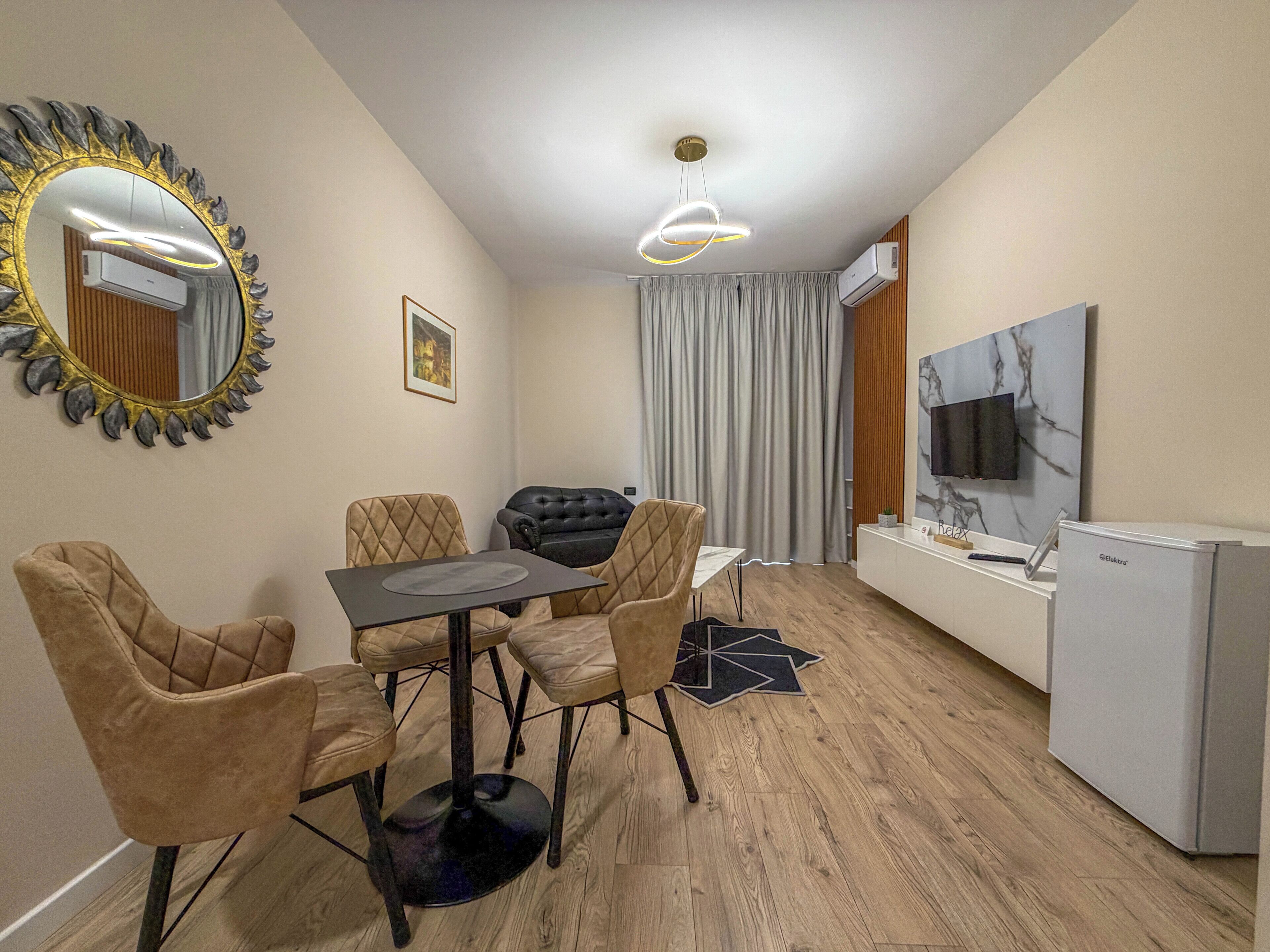 Apartamento, 1 quarto, vista para a cidade | Área de estar