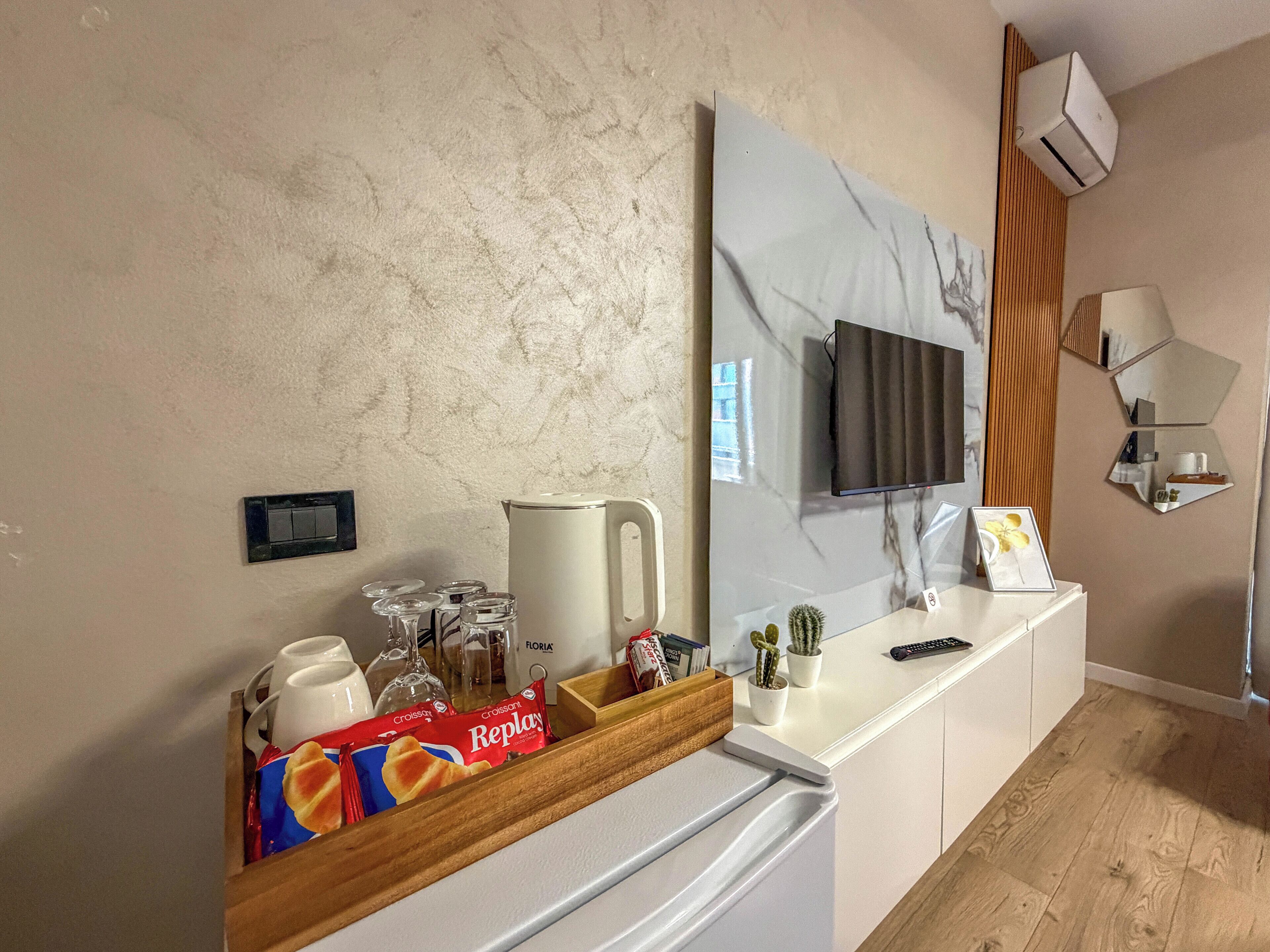 Double Room, Balcony, City View | Coffee and/or coffee maker