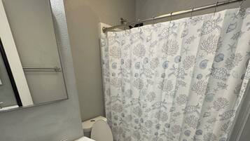 Hair dryer, towels, soap, toilet paper