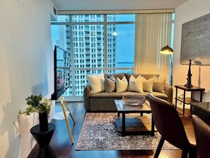 Suite Business, balcón, vistas a la ciudad | Zona de estar