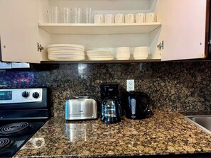 Suite Business, balcón, vistas a la ciudad | Cocina privada