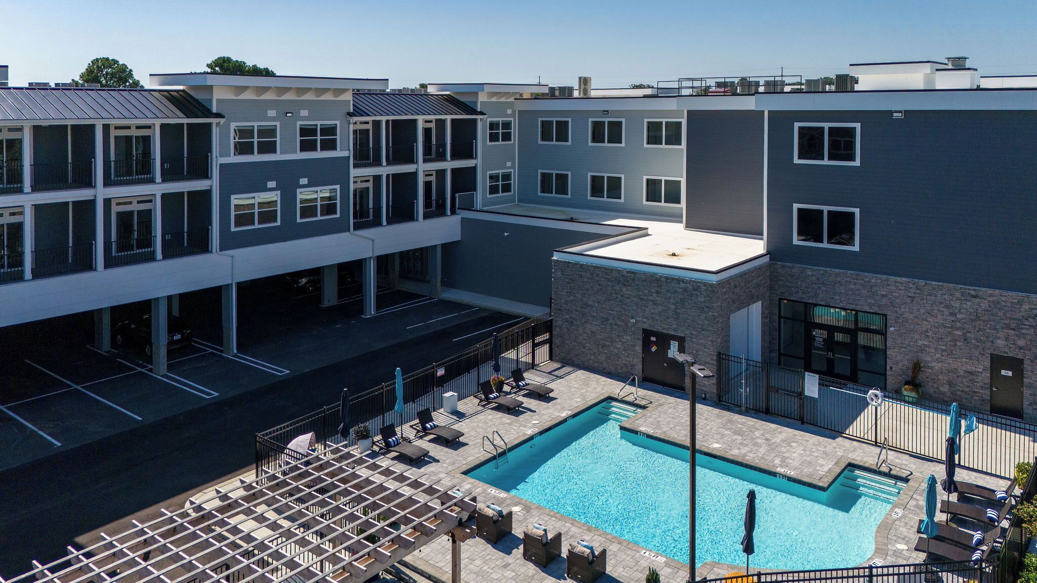 Pool, seating and veranda adjacent to the pool
