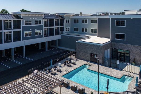 Pool, seating and veranda adjacent to the pool