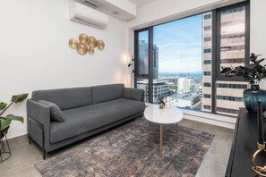 Living area - Sky-High Comfort at The Rubik (Cape Town)